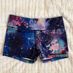 Galaxy colored spandex shorts.